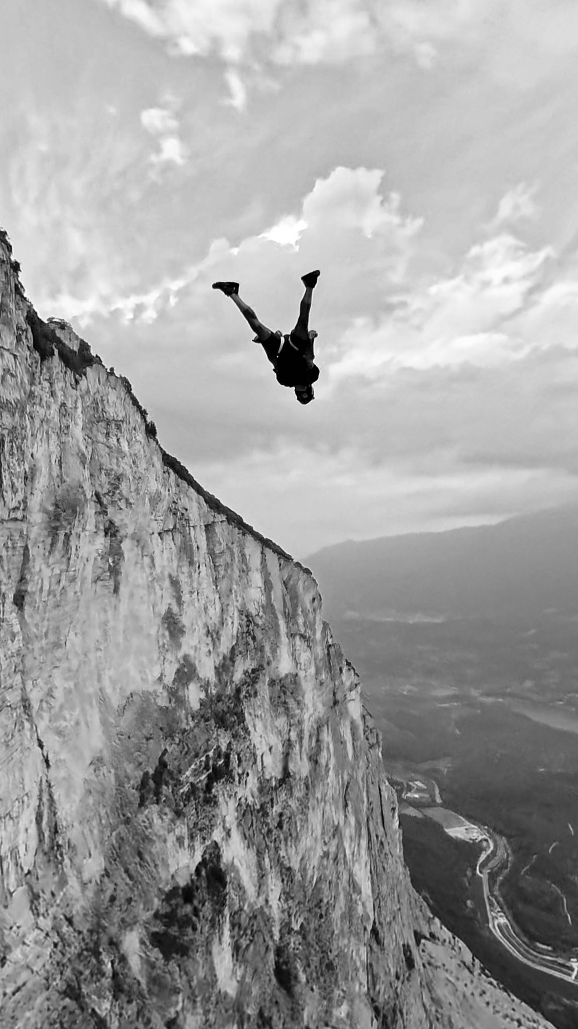Student preparing equipment during a beginner BASE jump course in Millau