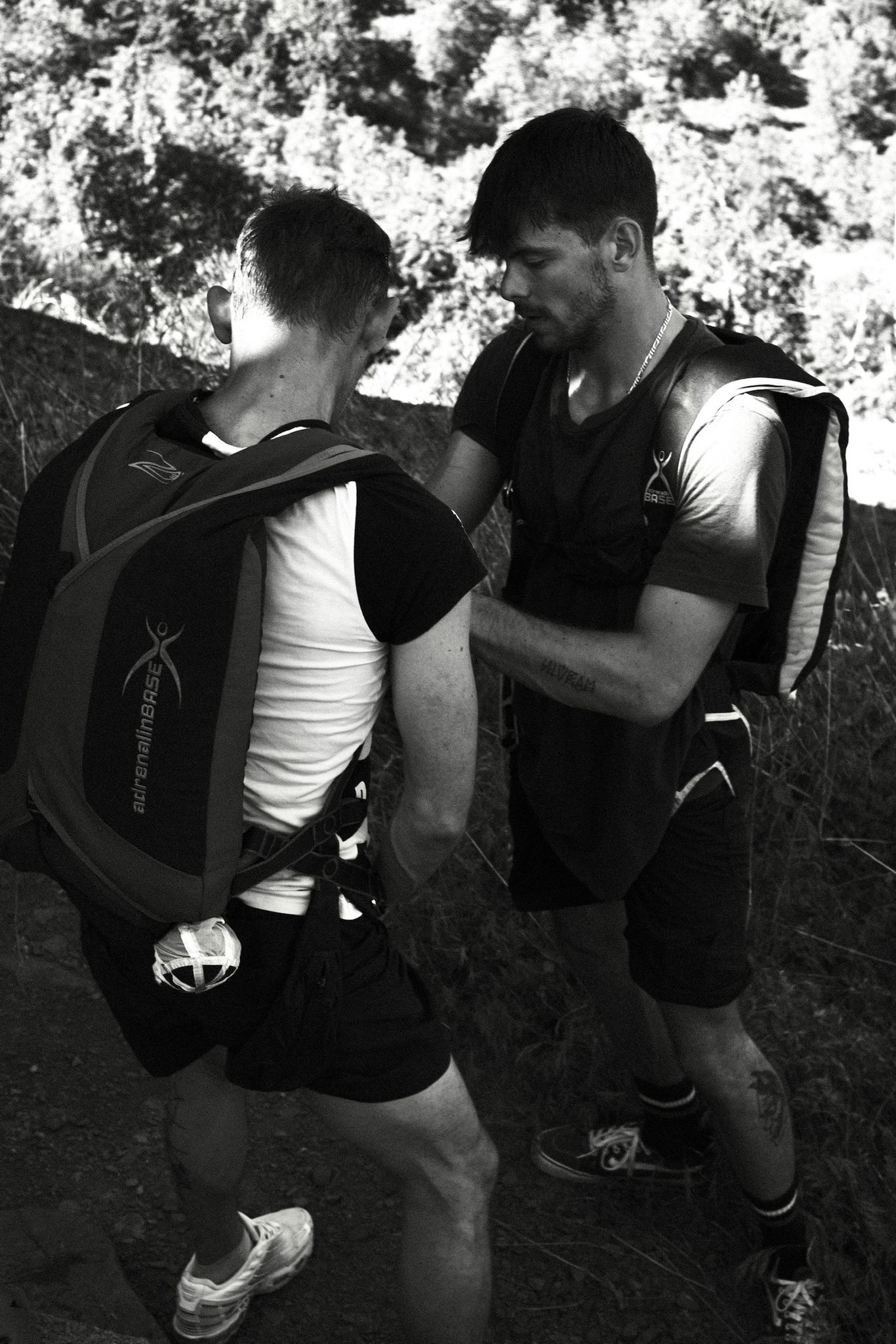 Student preparing equipment during a beginner BASE jump course in Millau